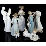 Llladro figure of a girl holding her bonnet and three Nao figures of children and Doulton figure