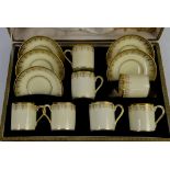 Ye Olde English Grosvenor cased set of coffee cans and saucers, lacking one saucer but with one