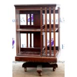 20th century mahogany revolving bookcase. 49W x 85H x 49D