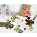 A small mixed collection of British and foreign coins as taken from circulation with a small bag