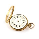 A ladies open face pocket watch with white enamel dial, black Roman numeral hour markers within a