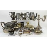 Selection of silver plated items to include tea service, flatware, candlesticks, mugs, toast racks