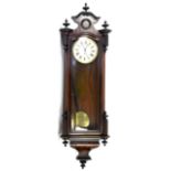 Mahogany Vienna style regulator wall clock, white enamel dial with Roman numerals, with pendulum and