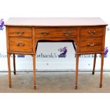 20th century mahogany bow fronted sideboard on spade feet. 124WQ x 62H x 60D