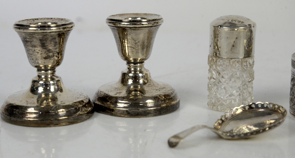 A Georgian silver caddy spoon, a pair of silver miniature candlesticks, a silver cup, white metal - Image 6 of 27