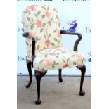 Stained beech elbow chair with floral upholstered seat and backrest, on shell carved knees and pad