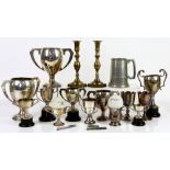 Group of silver-plated trophies, some with stands, various sizes, together with a pair of brass