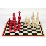 Red and white chess set and a set of weighing scales