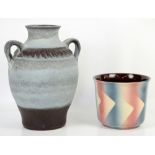 A large West German urn vase with twin handles, 40cm, and a West German plant pot with pink, blue