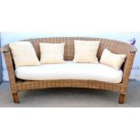 Wicker conservatory three seater sofa. 178W