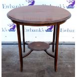 Early 20th century mahogany oval occasional table with fan shaped inlay. 74H x 76W x 54D