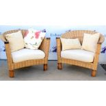 Pair of wicker conservatory armchairs.