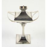 Arts and Crafts design large silver table lighter 15cm tall with trunk handles, London 1912