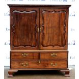 19th mahogany linen press with dentil cornice and two short drawers above one long drawer on ogee