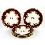 Early 19th Century Chamberlains Worcester set of five armorial cabinet plates, claret ground with