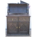 Oak chiffonier made of antique parts with later additions, carved front panels of 2 drawers above