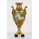 Continental urn the gilded body with relief painted panels. 37.5cm