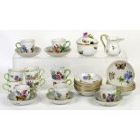 Herend 11 coffee cups and saucers, and spare saucers, decorated with butterflies and flowers, a