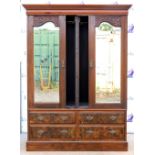 19/20th century mahogany wardrobe with three mirrored doors above four short drawers to base. 215H x