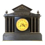 Late 19th century black slate mantel clock of architectural form, gilt dial with Arabic numerals,