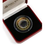 Pobjoy Mint. Titanium and Gold Proof Millennium 2000 coin, weight approx. 9gms - 24ct gold, 2gms