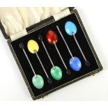 Cased set of silver and rainbow enamel coffee bean spoons by H.C. Dans, Birmingham 1950