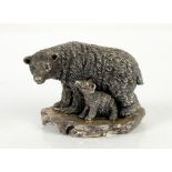 Large silver model of a Polar Bear with Cub on a rock or ice form base