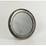 Silver topped black lacquered walking cane and a circular silver photograph frame,