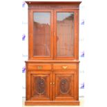 20th century mahogany side board glazed doors enclosing adjustable shelves over two drawers and