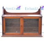 20th century mahogany glazed wall hanging cabinet with two doors. 48H x 94W x 30D