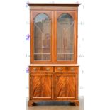 20th century mahogany bookcase cabinet with two astragal glazed doors above two short drawers