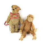 Vintage stuffed monkey toy with articulated arms and legs, 30cm long, and a vintage leather and fur,