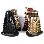 Character Group, four large Daleks, red/gold, all black, and bronze/gold x2, lacking controllers,