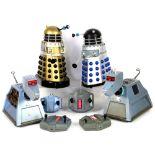Two radio controlled K-9's and two Product Enterprise Ltd. radio controlled Daleks, silver/blue