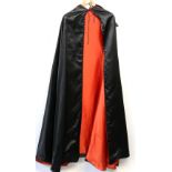 Black and red satin Dracula style cape.