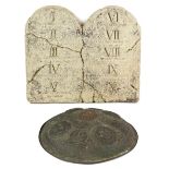The Ten Commandments - A brass shield and a foam gravestone with the brass shield from the Cecil B