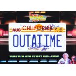 Back To The Future - ‘Outattime’ metal number plate signed by Christopher Lloyd and Michael J fox,