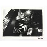 James Bond - Large black and white still showing the set of a a James Bond film, signed to the