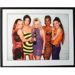 Spice Girls - A large signed photograph taken at Brit Awards in 1998, signed by the photographer