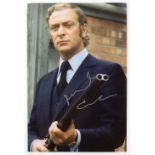 Michael Caine - Signed photo from his role in Get Carter, 8 x 12 inches.