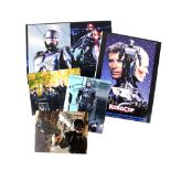 Robocop - Two signed photo displays one by Peter Weller and the other by director Paul Verhoeven,