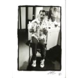 Queen - Original 10 x 8 inch Black and white silver gelatin print showing Freddie Mercury holding
