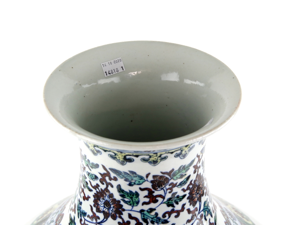 A large doucai style vase with trumpet neck, decorated with floral designs beneath a band of - Image 3 of 11