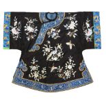 A Chinese textile jacket with blue-ground facings and floral designs; width of sleeves about 45