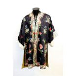 An elegant Chinese textile jacket with Imperial-Yellow lining and white-ground cuffs; overall length