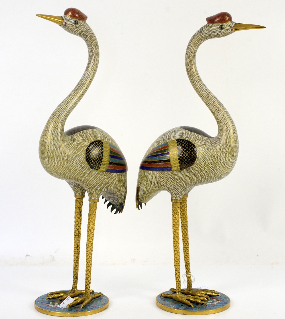 An impressive pair of Chinese Cloisonné enamel figures; each one designed as a standing red-capped - Image 2 of 6