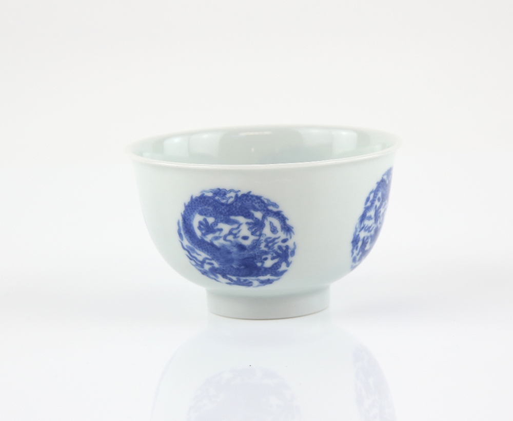 A blue and white bowl, decorated in the well with a coiled dragon roundel; the exterior with four - Image 2 of 4