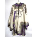 An elegant Chinese [or other Asian] off-white ground robe with wide sleeves, purple-ground facings