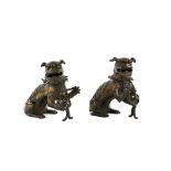 A pair of Chinese gilded-metal alloy incense burners; each one modelled as a Buddhistic Lion with