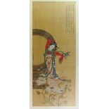 A Chinese picture of an ethereal figure above lotus; extensive inscriptions and three red seals;